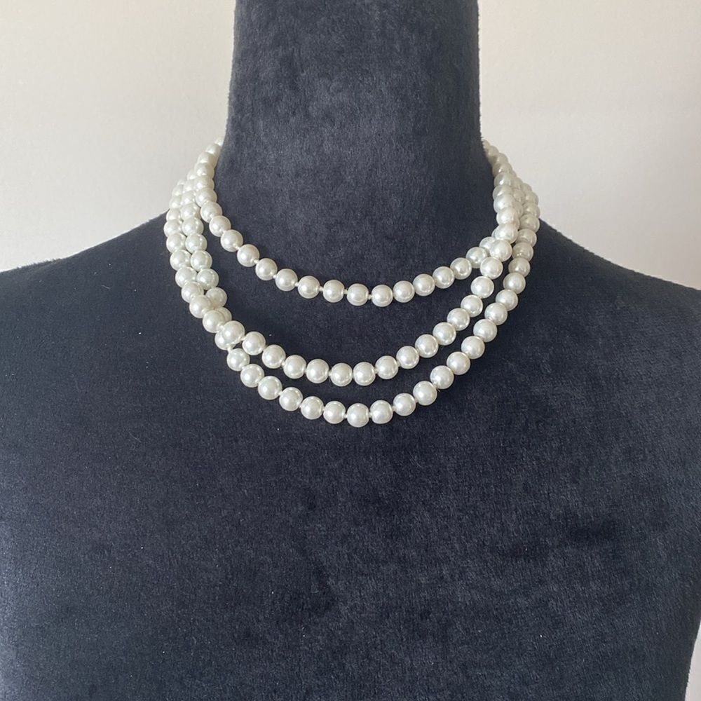 Long Strand Of Faux Pearls